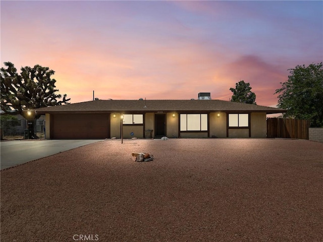 20654 Ottawa Rd, Apple Valley, CA 92308 - view of front facade with concrete driveway and a garage