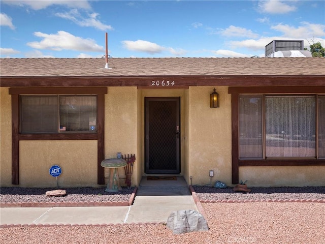 20654 Ottawa Rd, Apple Valley, CA 92308 - property entrance featuring stucco siding