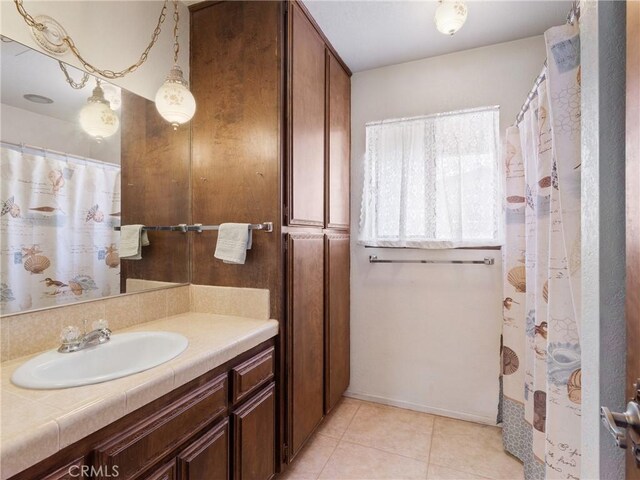 20654 Ottawa Rd, Apple Valley, CA 92308 - bathroom with vanity and tile patterned flooring