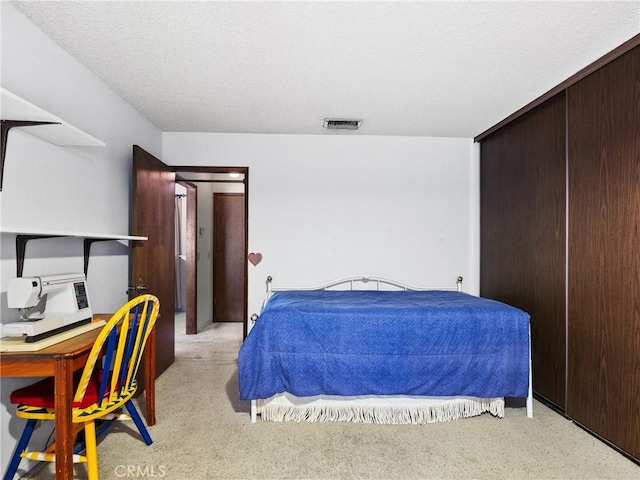 20654 Ottawa Rd, Apple Valley, CA 92308 - bedroom featuring light colored carpet, cooling unit, and a textured ceiling