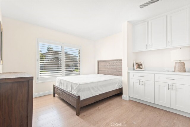 18559 Stonegate Ln, Rowland Heights, CA 91748 - bedroom with light wood finished floors and baseboards
