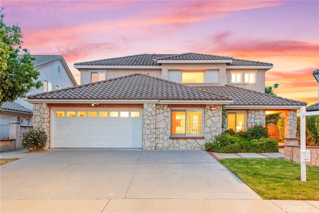 18559 Stonegate Ln, Rowland Heights, CA 91748 - view of front of home with stone siding, a tiled roof, driveway, and a garage