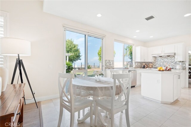 18559 Stonegate Ln, Rowland Heights, CA 91748 - dining area with light tile patterned floors, recessed lighting, and baseboards