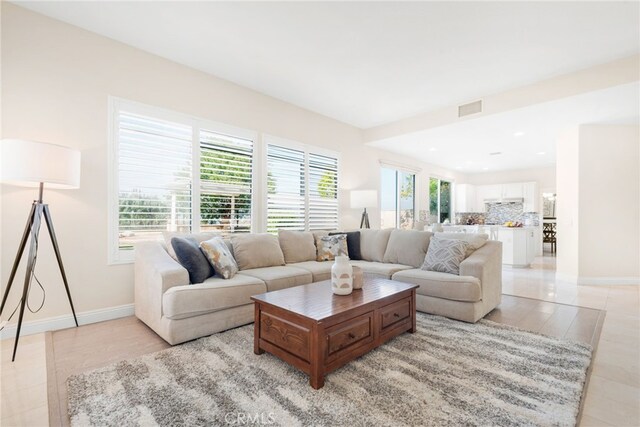18559 Stonegate Ln, Rowland Heights, CA 91748 - living area with baseboards, light tile patterned floors, and recessed lighting