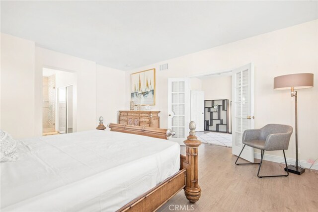18559 Stonegate Ln, Rowland Heights, CA 91748 - bedroom featuring wood finished floors, french doors, and baseboards