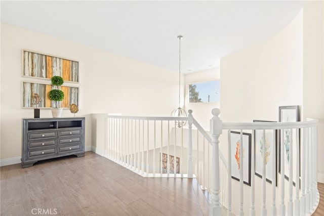 18559 Stonegate Ln, Rowland Heights, CA 91748 - corridor featuring an upstairs landing, wood finished floors, and baseboards