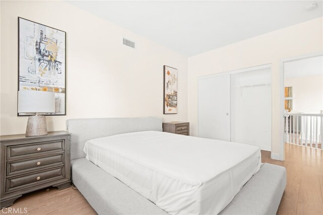 18559 Stonegate Ln, Rowland Heights, CA 91748 - bedroom featuring light wood-type flooring and a closet