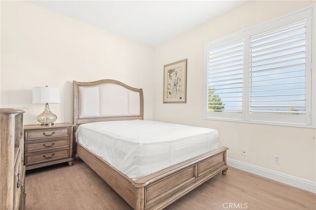 18559 Stonegate Ln, Rowland Heights, CA 91748 - bedroom with light wood-type flooring and baseboards