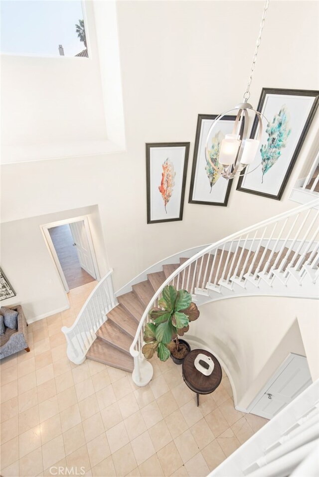 18559 Stonegate Ln, Rowland Heights, CA 91748 - staircase featuring a high ceiling