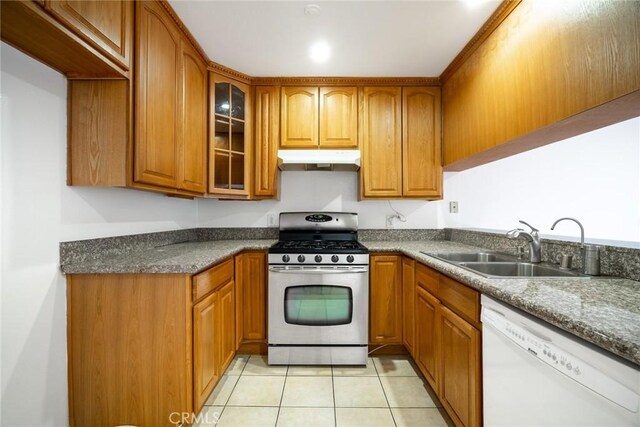 10149 Commerce Ave Unit 8, Tujunga, CA 91042 - kitchen featuring stainless steel range with gas cooktop, dishwasher, a sink, under cabinet range hood, and brown cabinets