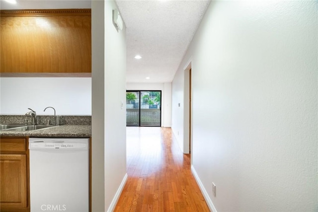 10149 Commerce Ave Unit 8, Tujunga, CA 91042 - hall featuring a sink, light wood finished floors, baseboards, and recessed lighting
