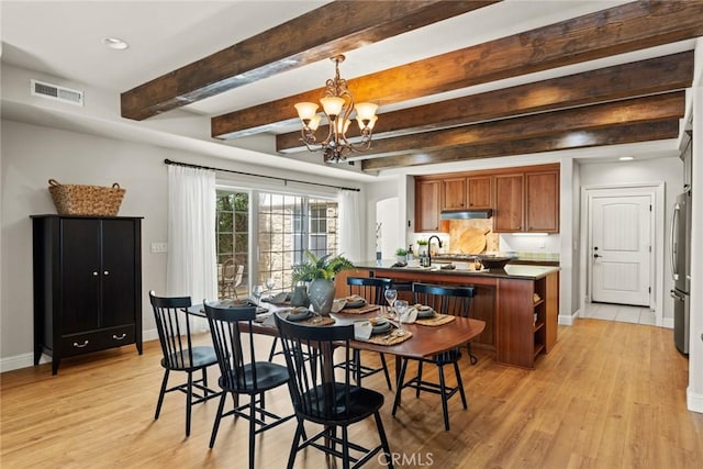 35 Veneto Cir, Chico, CA 95926 - dining area featuring light wood-style flooring, baseboards, a chandelier, beam ceiling, and recessed lighting
