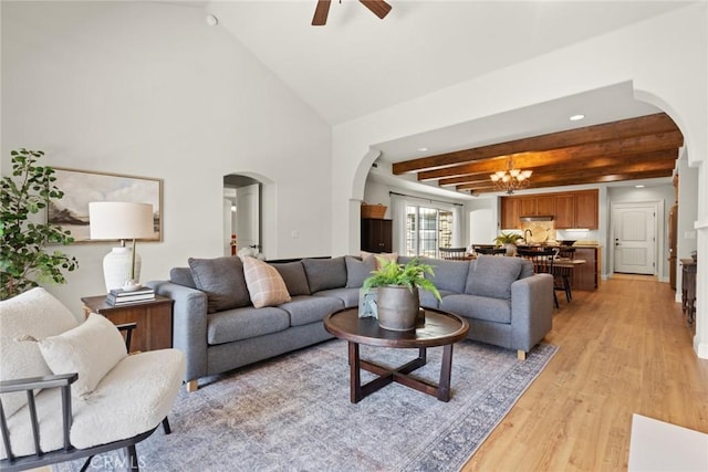 35 Veneto Cir, Chico, CA 95926 - living room with arched walkways, light wood finished floors, ceiling fan, beam ceiling, and recessed lighting