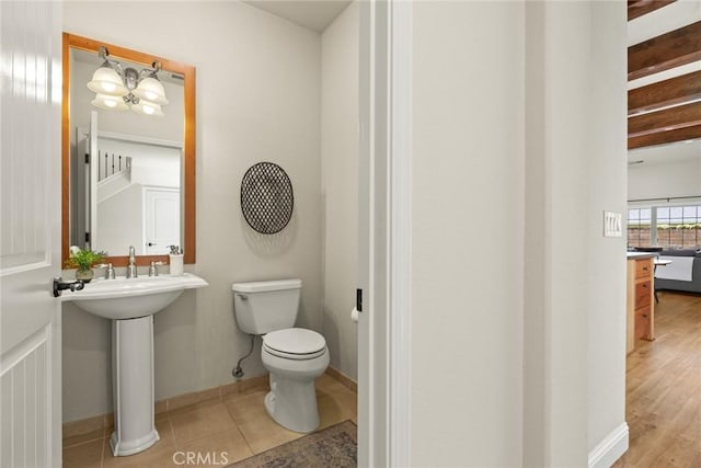 35 Veneto Cir, Chico, CA 95926 - bathroom featuring toilet, a sink, tile patterned flooring, and baseboards