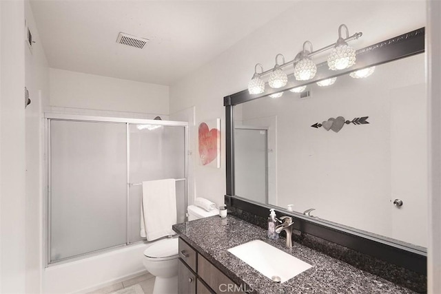 821 S Cerritos Ave Unit 17, Azusa, CA 91702 - bathroom featuring vanity, toilet, and combined bath / shower with glass door