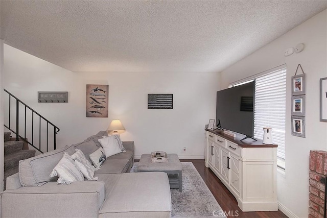 821 S Cerritos Ave Unit 17, Azusa, CA 91702 - living area with dark wood-type flooring, a textured ceiling, baseboards, and stairs