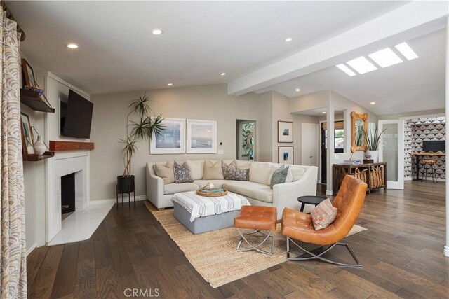 292 Bowling Green Dr, Costa Mesa, CA 92626 - living area featuring vaulted ceiling, wood finished floors, recessed lighting, and a fireplace with flush hearth