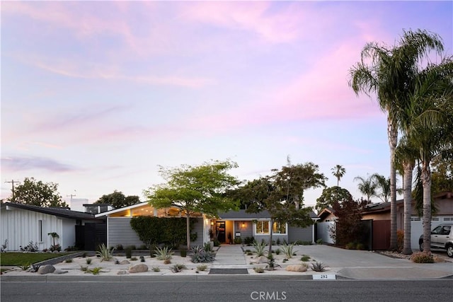 292 Bowling Green Dr, Costa Mesa, CA 92626 - mid-century home with driveway and an attached garage