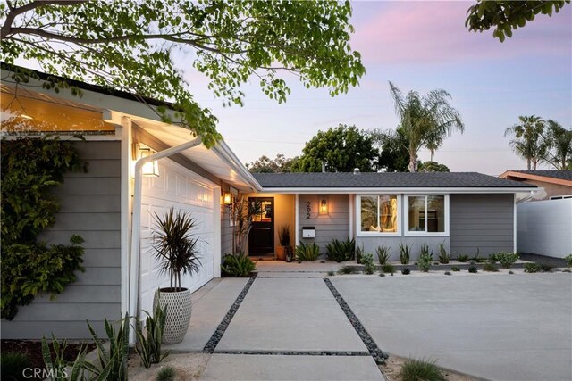 292 Bowling Green Dr, Costa Mesa, CA 92626 - ranch-style home with an attached garage and driveway