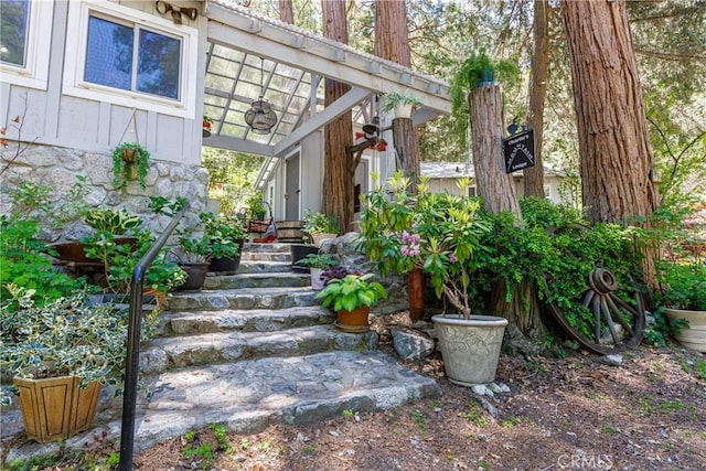 9091 Mountain View Dr, Forest Falls, CA 92339 - property entrance featuring covered porch and stone siding