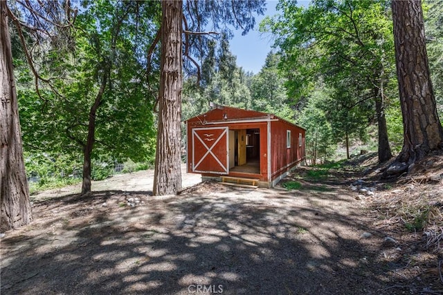 9091 Mountain View Dr, Forest Falls, CA 92339 - view of outdoor structure with a forest view