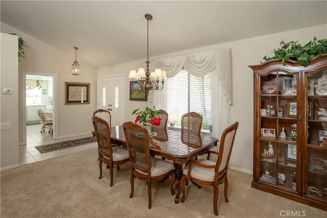 11 Jasmine Creek Ln, Laguna Hills, CA 92653 - dining room featuring a chandelier, light carpet, and vaulted ceiling