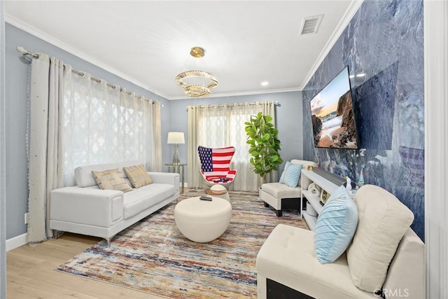 6149 Rosemead Blvd, Temple City, CA 91780 - living area featuring crown molding, wood finished floors, a chandelier, and baseboards