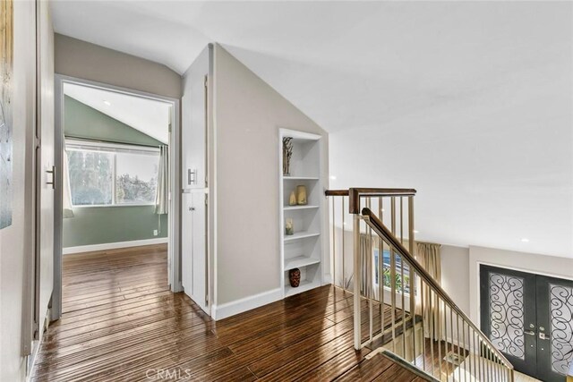 18534 Dylan St, Porter Ranch, CA 91326 - corridor featuring an upstairs landing, lofted ceiling, wood finished floors, and baseboards