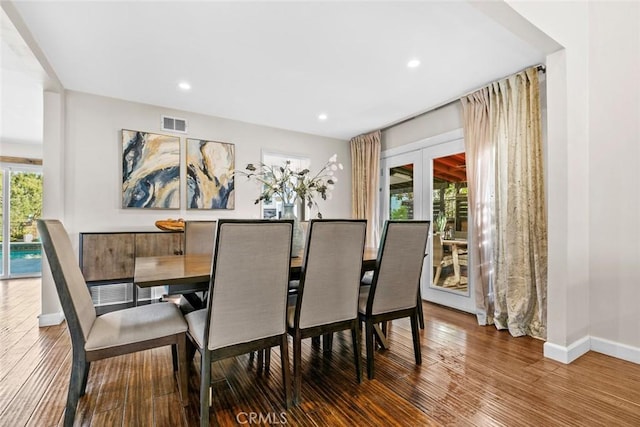 18534 Dylan St, Porter Ranch, CA 91326 - dining space with wood finished floors, baseboards, and recessed lighting