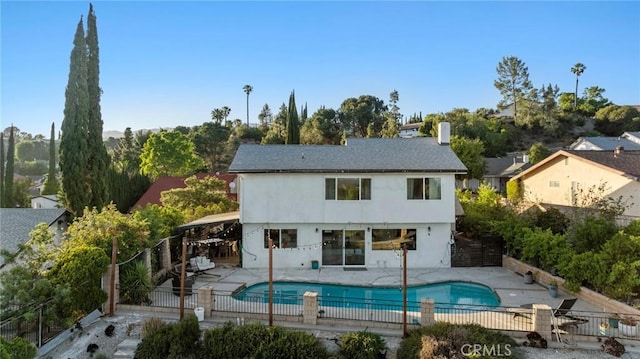 18534 Dylan St, Porter Ranch, CA 91326 - rear view of house with a fenced backyard, a patio, stucco siding, and a gazebo