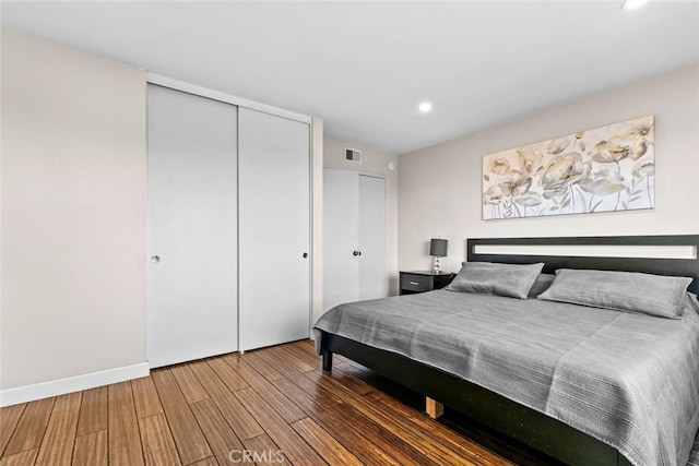 18534 Dylan St, Porter Ranch, CA 91326 - bedroom featuring wood finished floors, a closet, recessed lighting, and baseboards