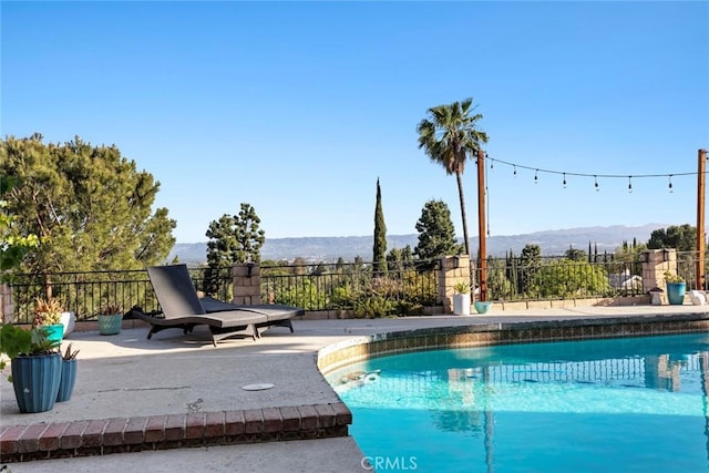 18534 Dylan St, Porter Ranch, CA 91326 - view of pool with a mountain view and a patio area
