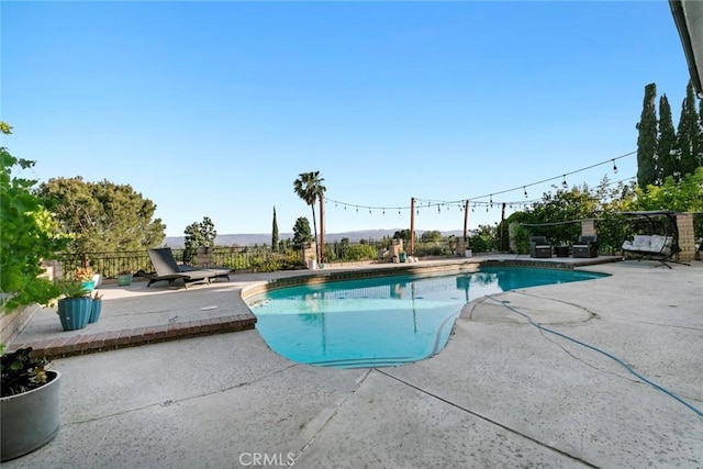 18534 Dylan St, Porter Ranch, CA 91326 - view of swimming pool with a patio area