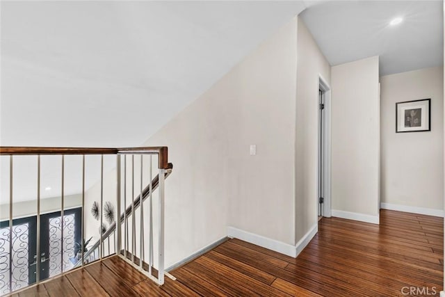 18534 Dylan St, Porter Ranch, CA 91326 - stairway featuring wood finished floors and baseboards