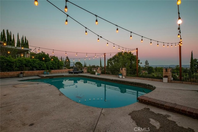 18534 Dylan St, Porter Ranch, CA 91326 - pool at dusk featuring a patio
