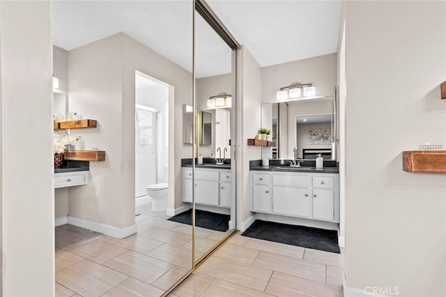 18534 Dylan St, Porter Ranch, CA 91326 - full bathroom with a shower stall, toilet, and vanity