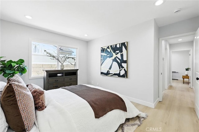 12632 Halcourt Ave, Norwalk, CA 90650 - bedroom with light wood-style floors, recessed lighting, and baseboards