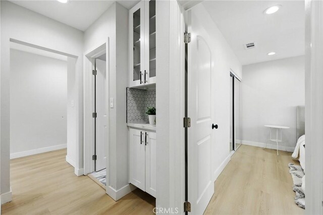 12632 Halcourt Ave, Norwalk, CA 90650 - hall featuring light wood-style flooring, baseboards, and recessed lighting