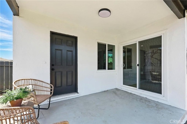 12632 Halcourt Ave, Norwalk, CA 90650 - property entrance featuring stucco siding and a patio area