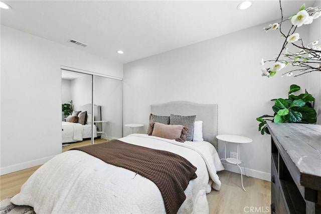 12632 Halcourt Ave, Norwalk, CA 90650 - bedroom featuring baseboards, recessed lighting, light wood-type flooring, and a closet