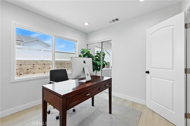 12632 Halcourt Ave, Norwalk, CA 90650 - home office featuring light wood-style floors, baseboards, and recessed lighting