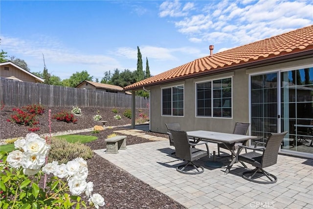 8640 Erika Ct, Atascadero, CA 93422 - fenced backyard with a patio and outdoor dining space