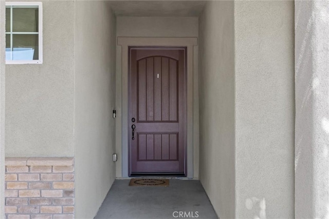 8640 Erika Ct, Atascadero, CA 93422 - view of exterior entry featuring stucco siding