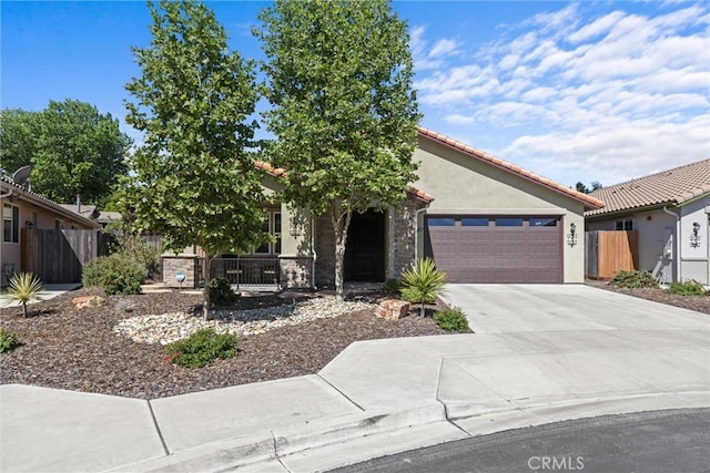 8640 Erika Ct, Atascadero, CA 93422 - view of front of property with an attached garage, driveway, and stucco siding