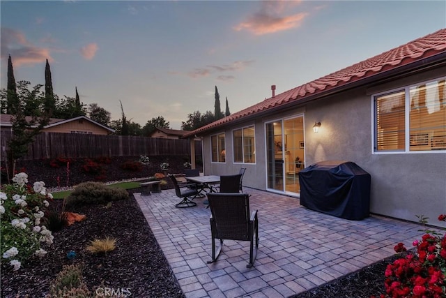 8640 Erika Ct, Atascadero, CA 93422 - fenced backyard featuring area for grilling, a patio area, and outdoor dining space