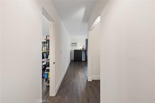 1222 N Olive Dr Unit 409, West Hollywood, CA 90069 - hall with wood finished floors, baseboards, and a wall mounted AC