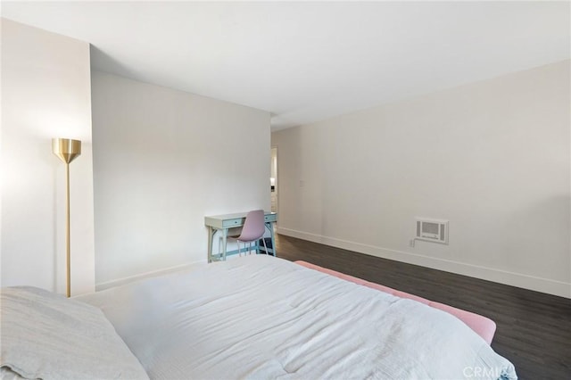1222 N Olive Dr Unit 409, West Hollywood, CA 90069 - bedroom featuring dark wood-style floors and baseboards