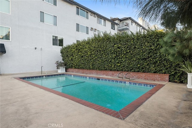 1222 N Olive Dr Unit 409, West Hollywood, CA 90069 - view of pool with a patio