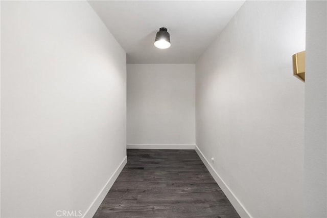 1222 N Olive Dr Unit 409, West Hollywood, CA 90069 - spare room with baseboards and dark wood finished floors