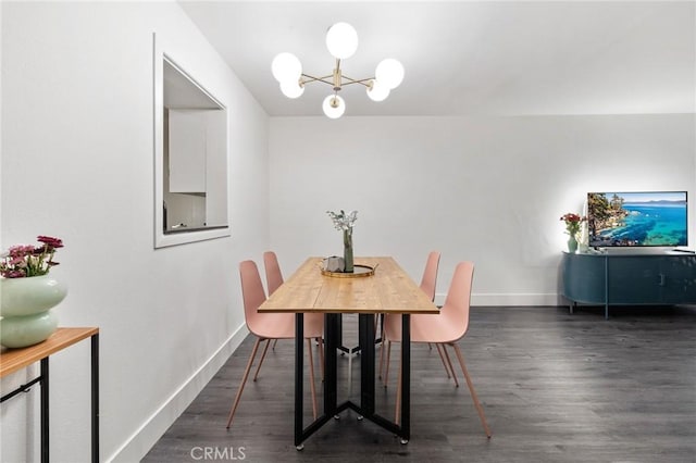 1222 N Olive Dr Unit 409, West Hollywood, CA 90069 - dining space featuring a chandelier, wood finished floors, and baseboards